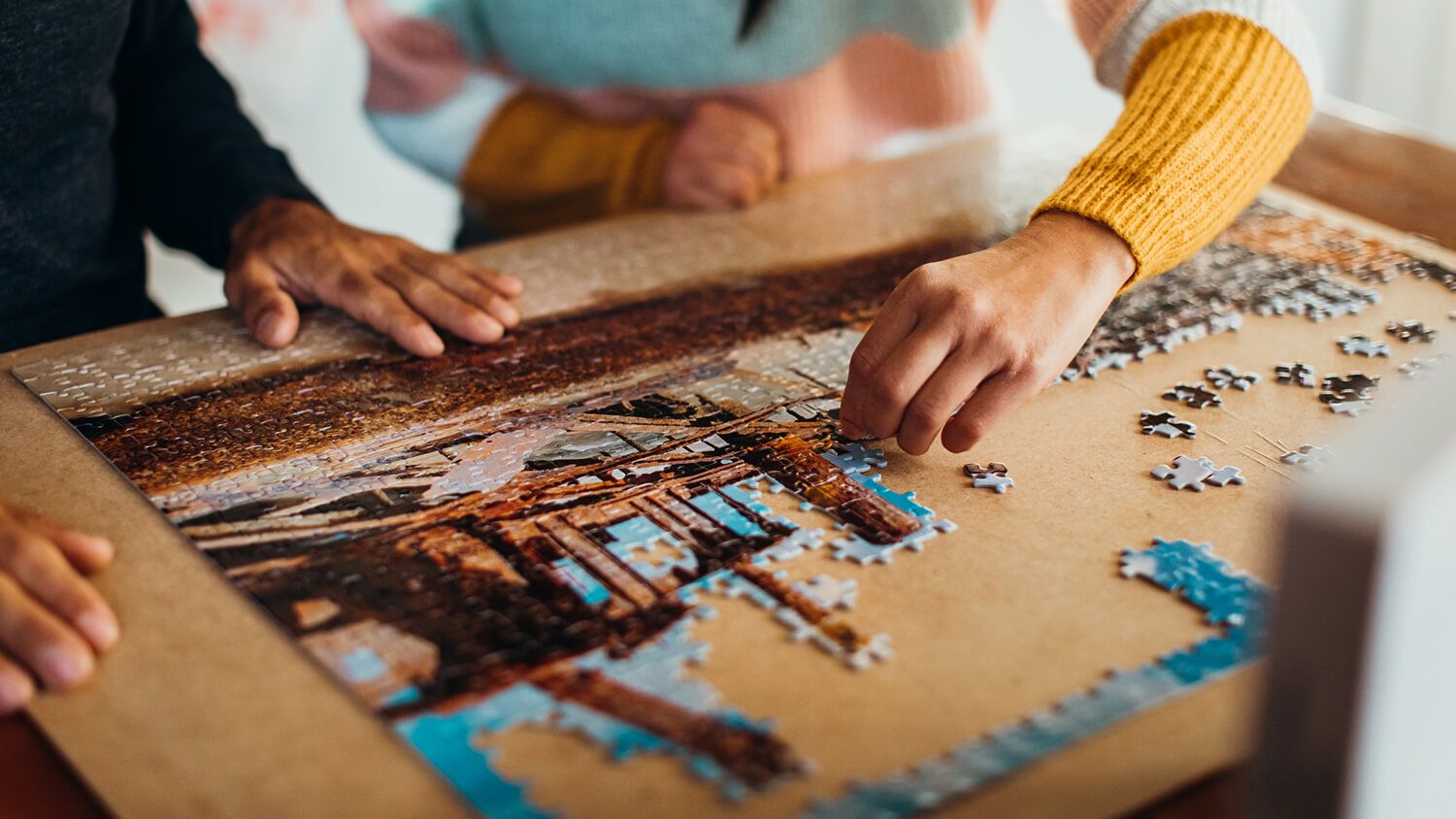 Time Management game of jigsaw puzzle, where people are arranging the puzzle pieces