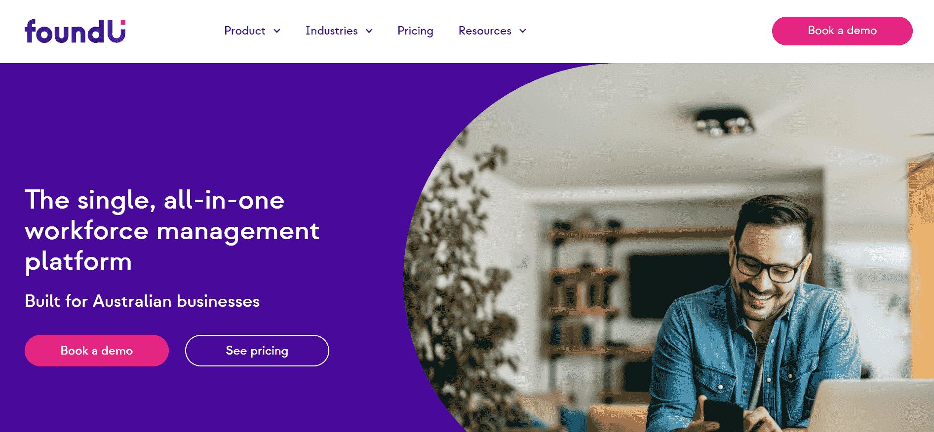 Website homepage of FoundU a top hris system in Australia showing a person looking at the phone and text is mentioned